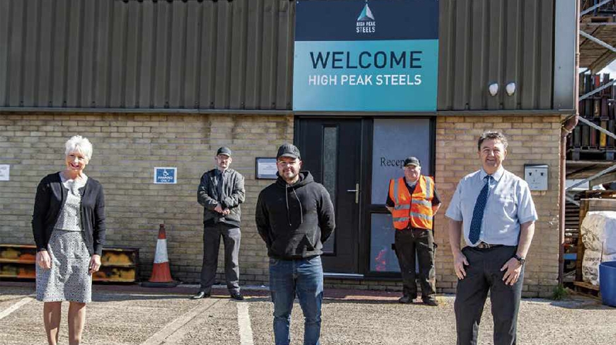 High Peak Steels employees standing outside the office building