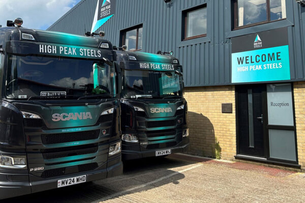 steel-stockholders-history-2024d Two High Peak Steels wagons parked by reception