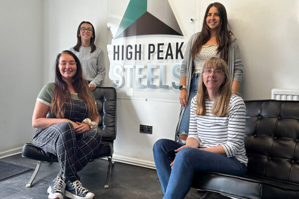 40-years-photos-ladies High Peak Steels employees posing for a photo